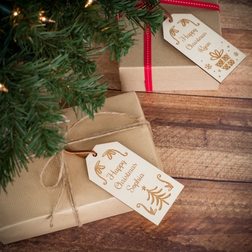 Two Personalised Christmas Gift Tags With Scroll Design